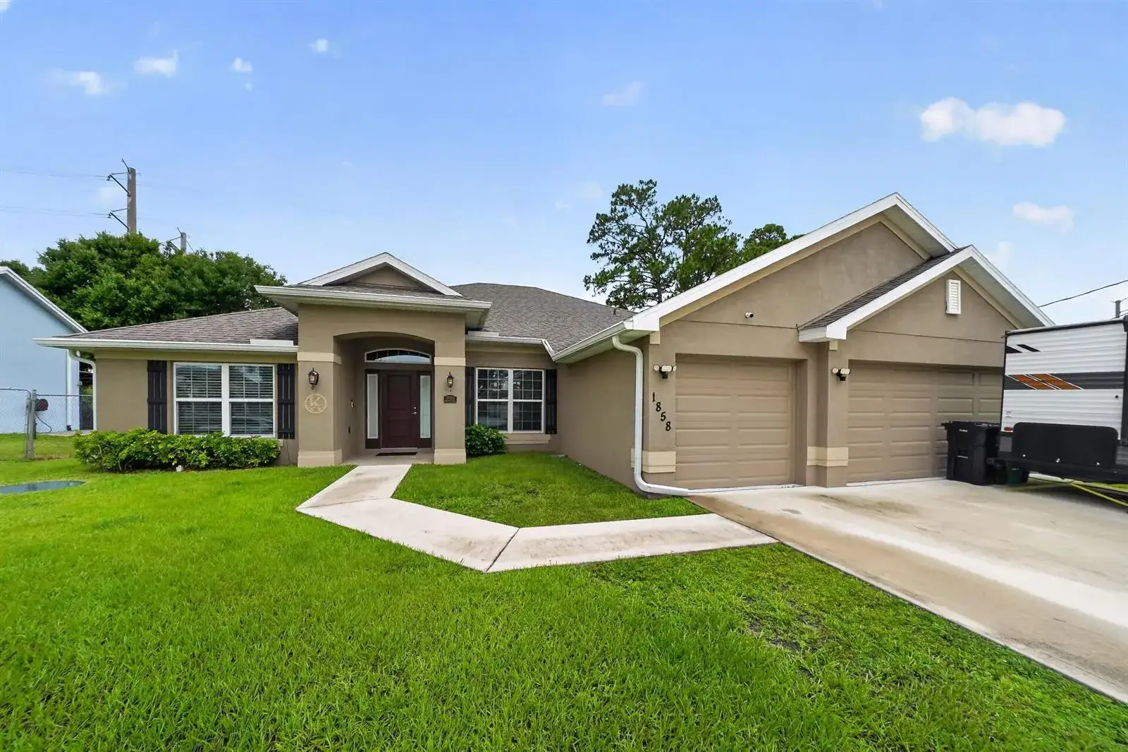 1858 SW Mackenzie Street, Port St. Lucie FL 34953