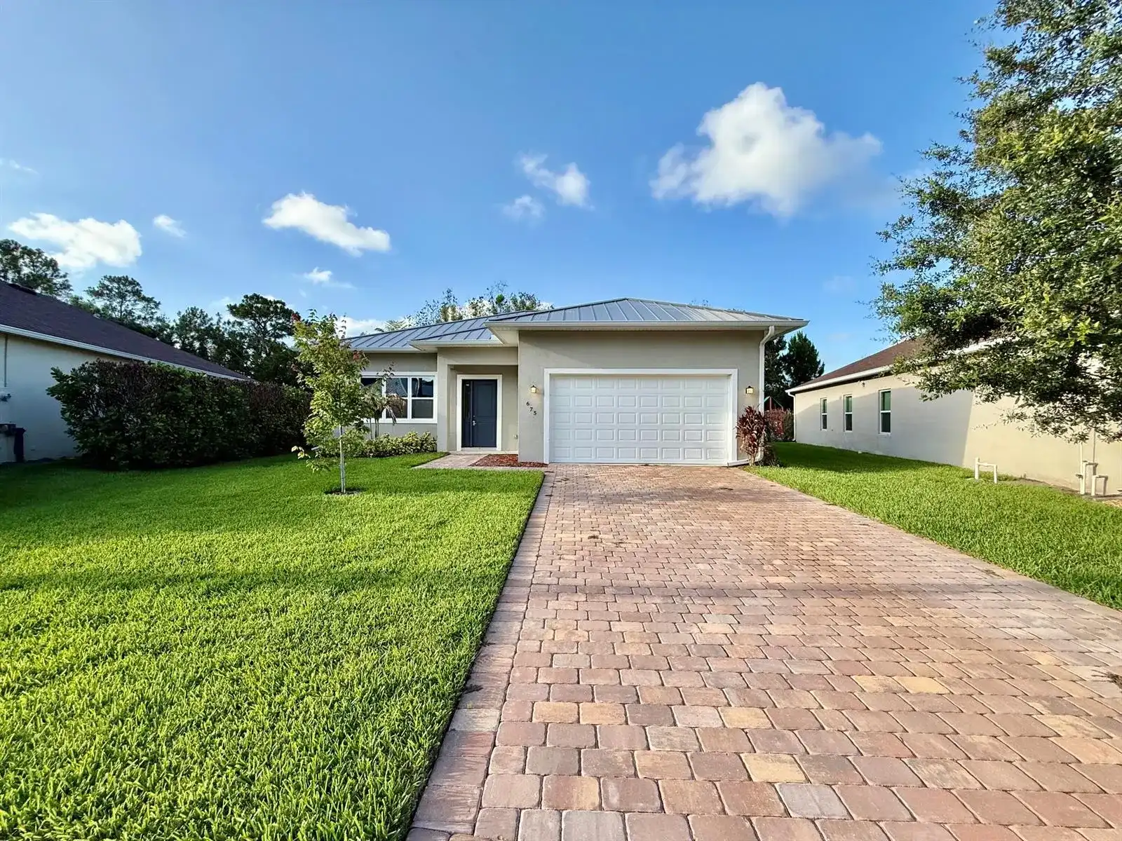 675 NE Moss Rose Place, Port St. Lucie FL 34983