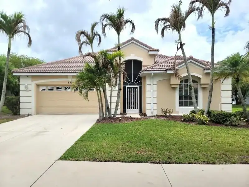 895 SW Lake Charles Circle, Port St. Lucie FL 34986