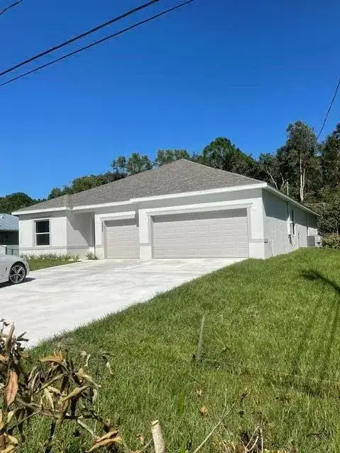 4958 NW FLINTSTONE Avenue, Port St. Lucie FL 34983
