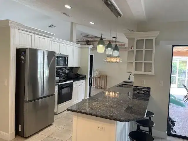618 SE STREAMLET Avenue, Port St. Lucie FL 34983 photo 2