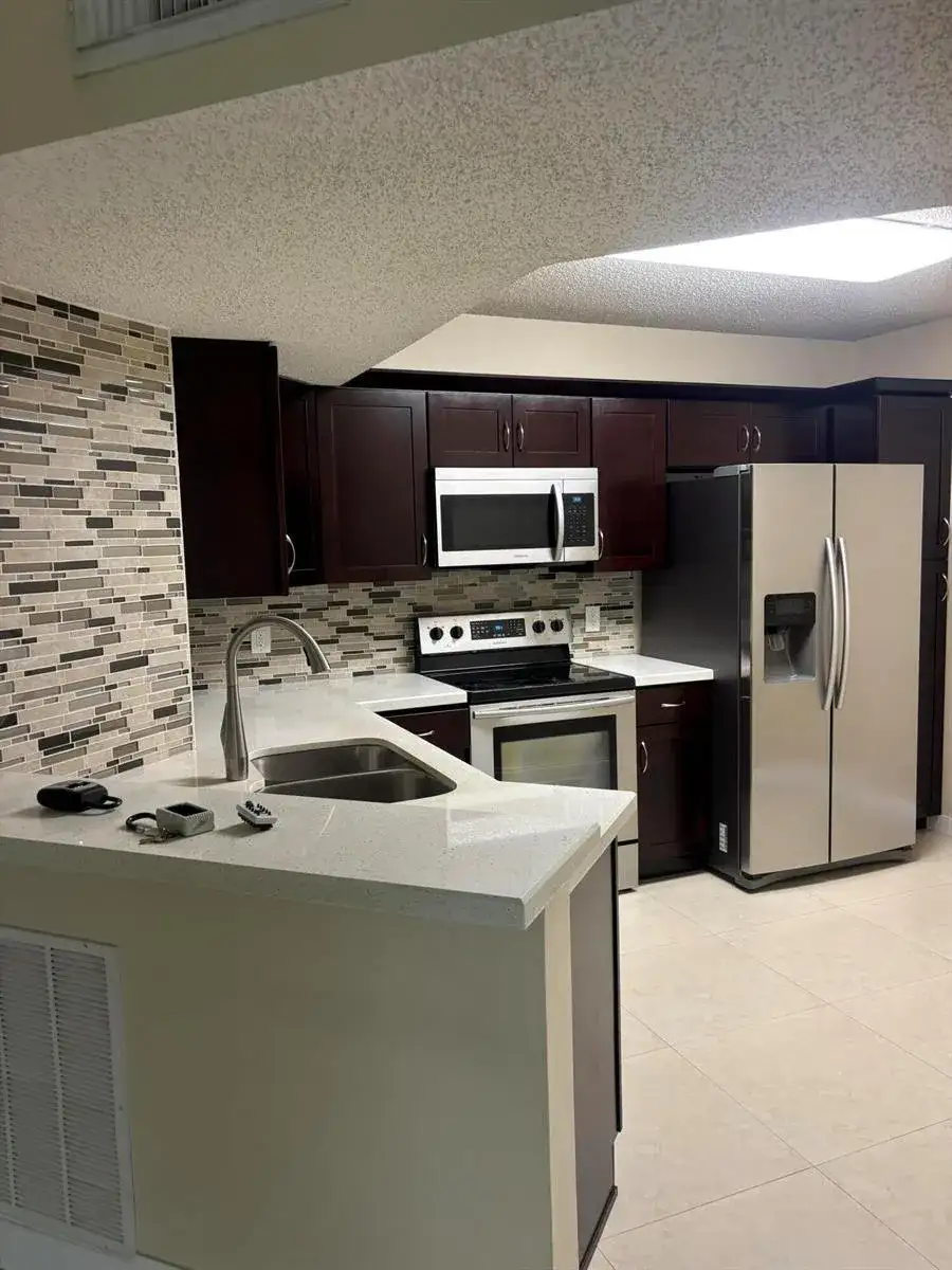 8761 WILES Road # 304, Coral Springs FL 33067 photo 2