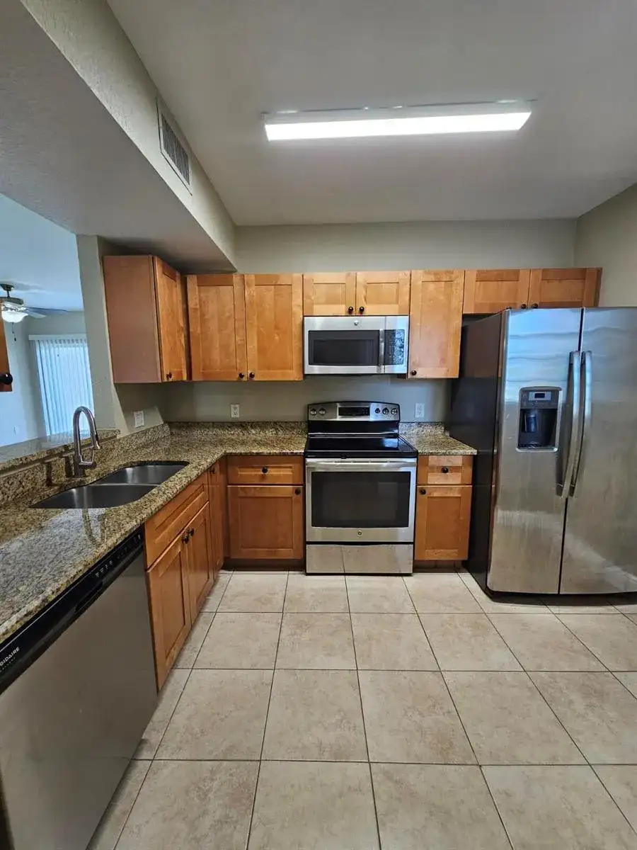 1049 GOLDEN LAKES Boulevard # 115, West Palm Beach FL 33411 photo 3