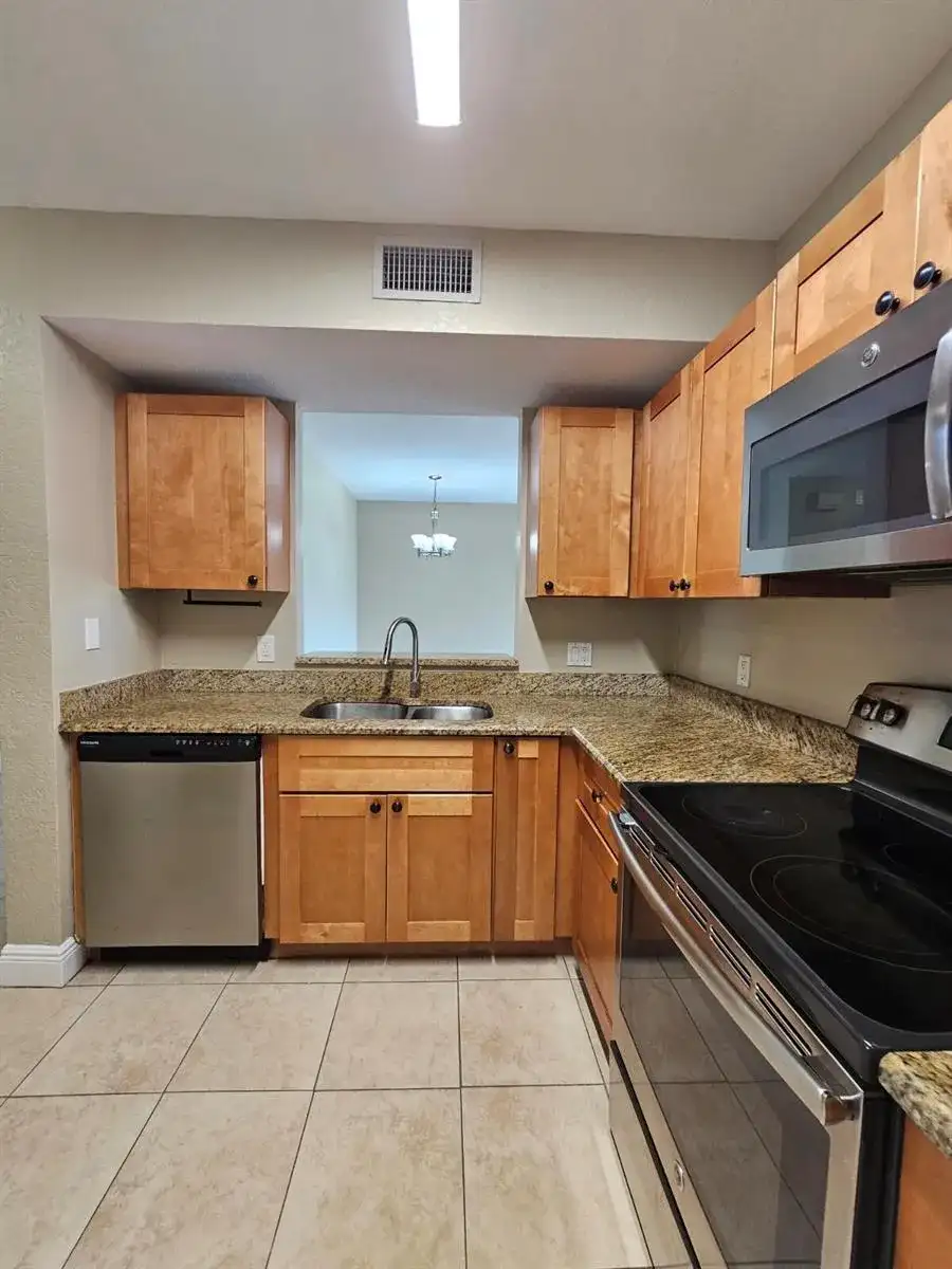 1049 GOLDEN LAKES Boulevard # 115, West Palm Beach FL 33411 photo 5