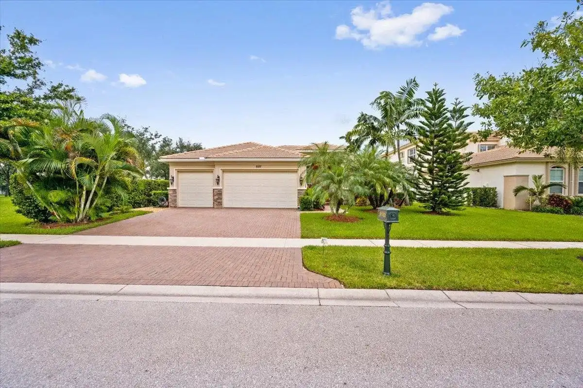 8152 Butler Greenwood Drive, Royal Palm Beach FL 33411