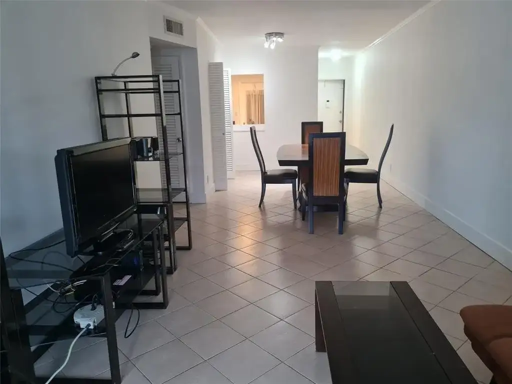 300 Golden Isles Drive # 104, Hallandale Beach FL 33009 photo 2
