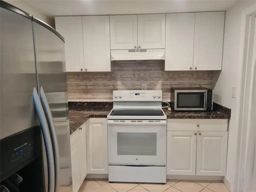 300 Golden Isles Drive # 104, Hallandale Beach FL 33009 photo 3