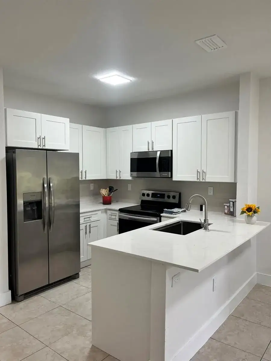 4414 WOODLAND Circle, Tamarac FL 33319 photo 5