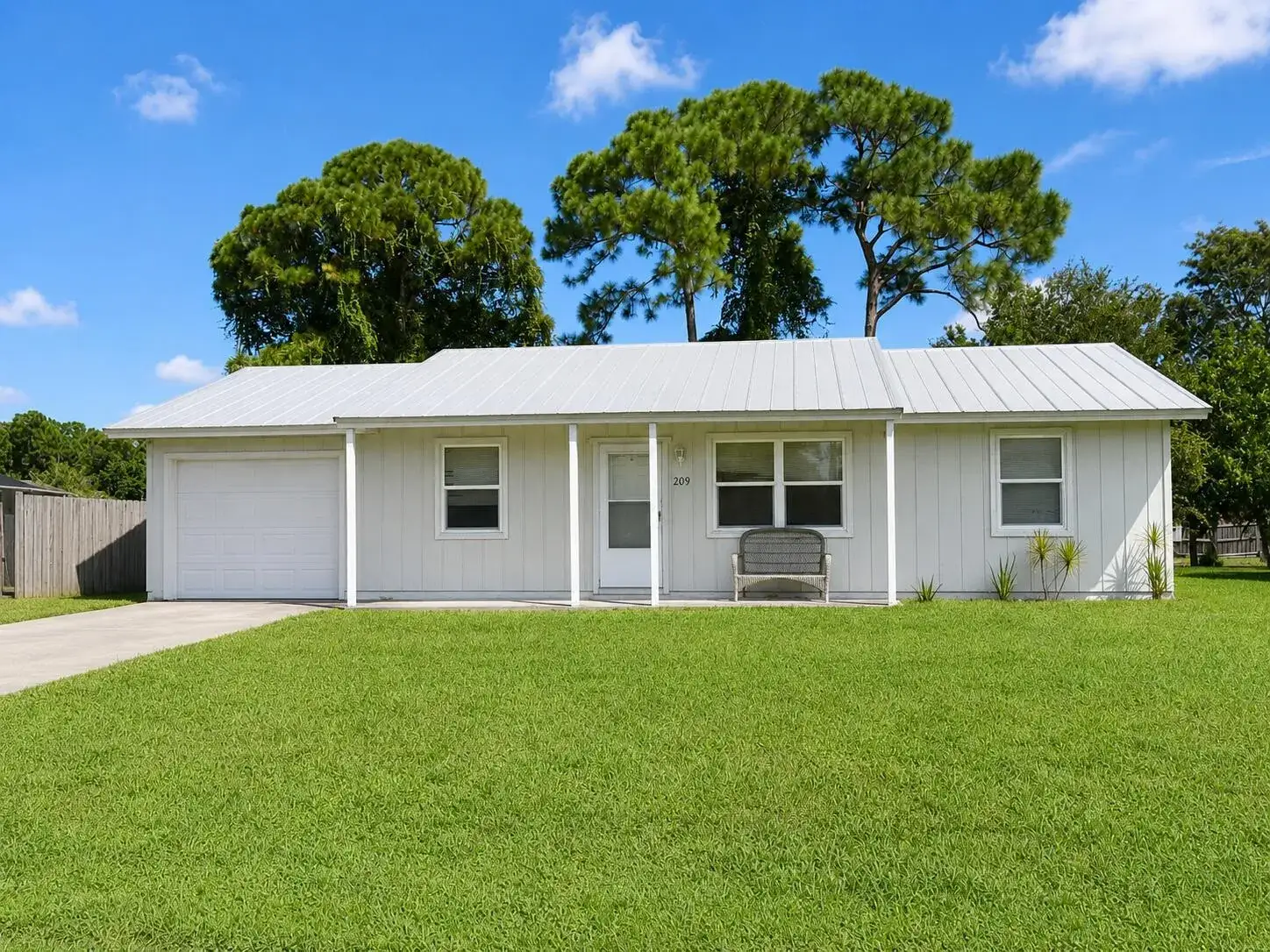 209 SW Chapman Avenue, Port St. Lucie FL 34984