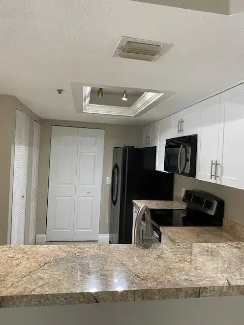 5061 Wiles Road # 205, Coconut Creek FL 33073 photo 2