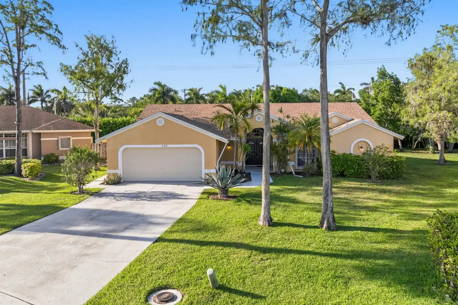 104 Oxford Court, Royal Palm Beach FL 33411