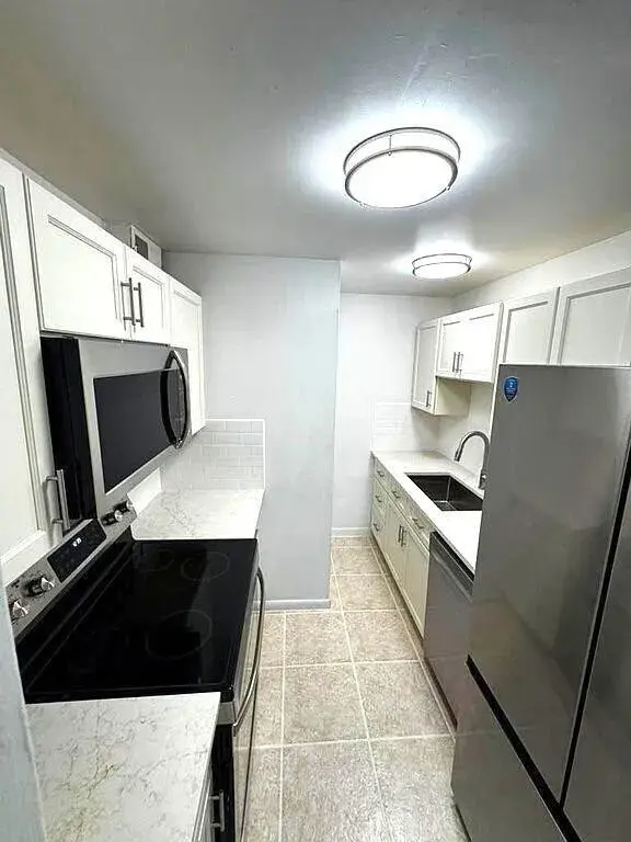1020 CRYSTAL LAKE Drive # 103, Deerfield Beach FL 33064