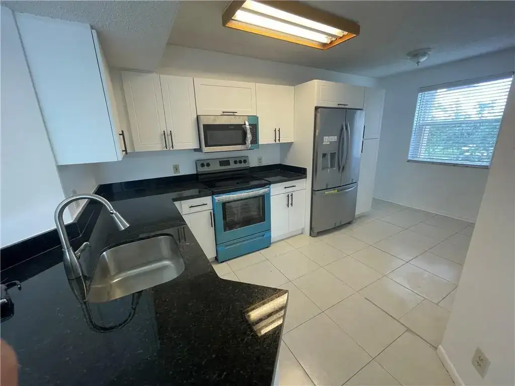 9033 WILES Road # 302, Coral Springs FL 33067 photo 3