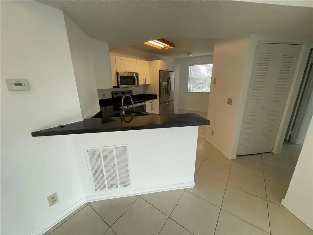 9033 WILES Road # 302, Coral Springs FL 33067 photo 5