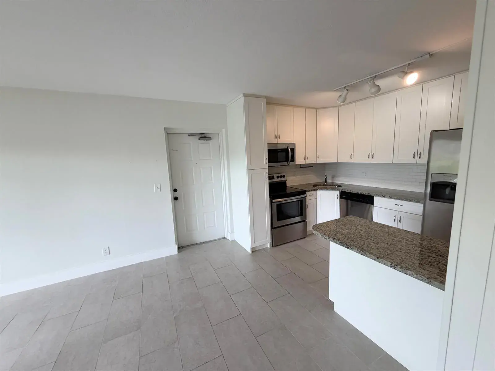 1112 GREEN PINE Boulevard # F1, West Palm Beach FL 33409