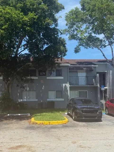 1179 N BENOIST FARMS Road # 205, West Palm Beach FL 33411