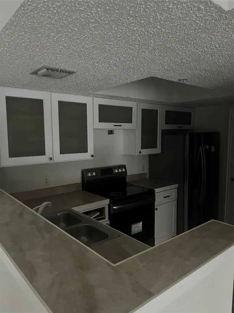 5031 Wiles Road # 202, Coconut Creek FL 33073 photo 3