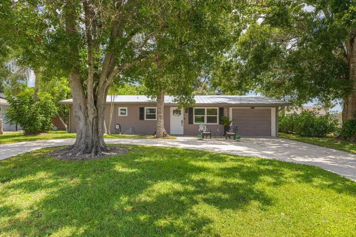 477 SE Asbury Lane, Port St. Lucie FL 34983