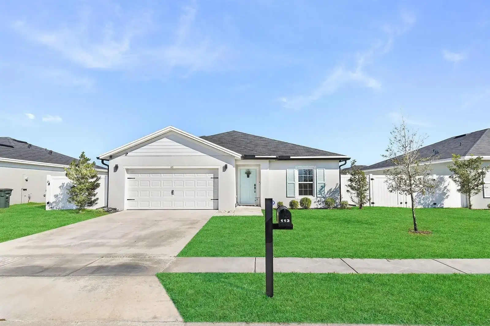 113 Dabou Loop, Belle Glade FL 33430 photo 2