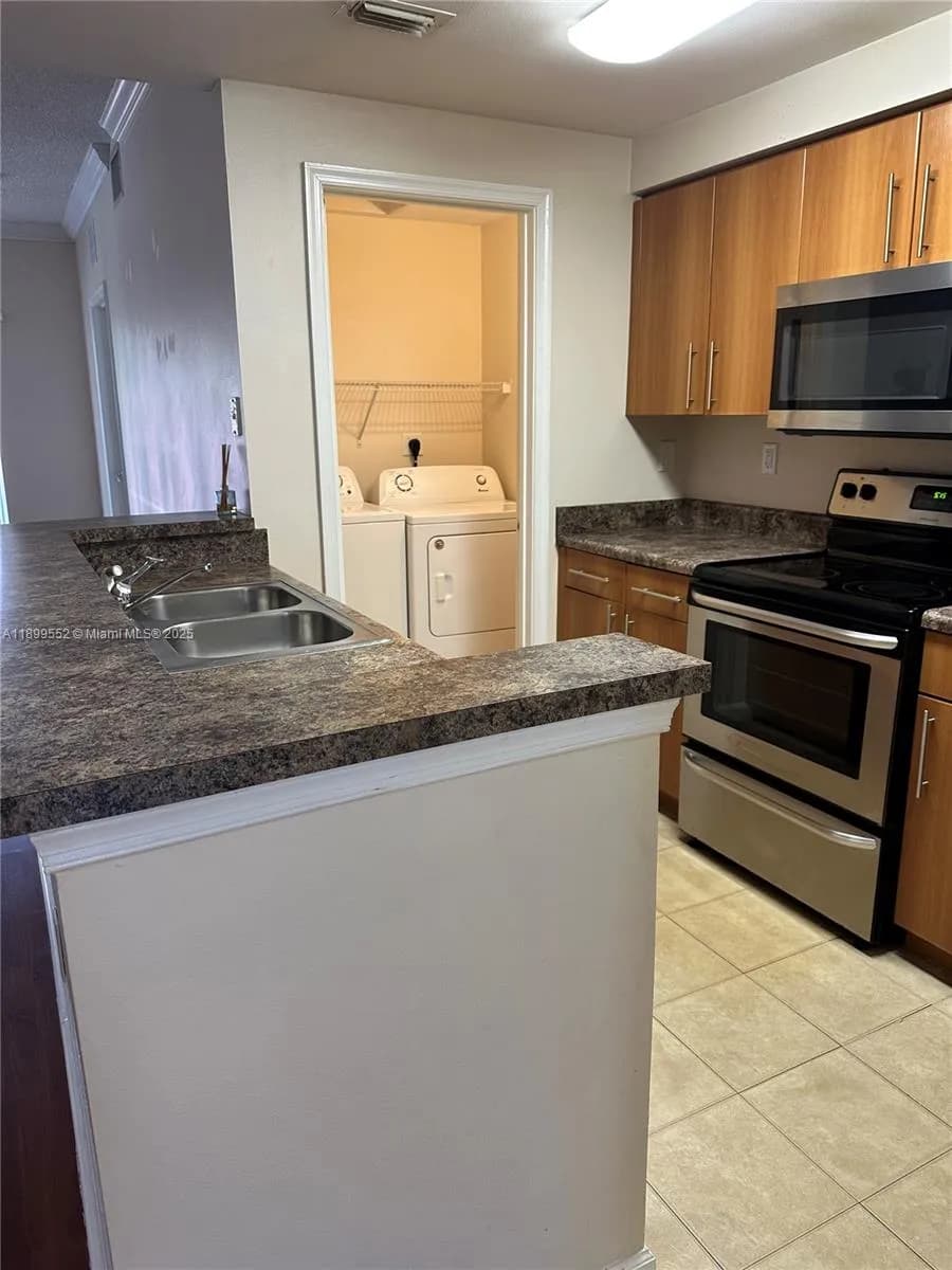 5840 W Sample Rd # 306, Coral Springs FL 33067