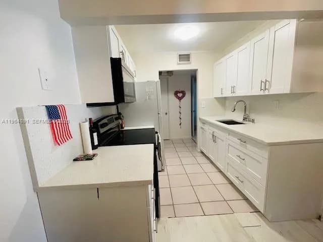 5180 E Sabal Palm Blvd # 235, Tamarac FL 33319