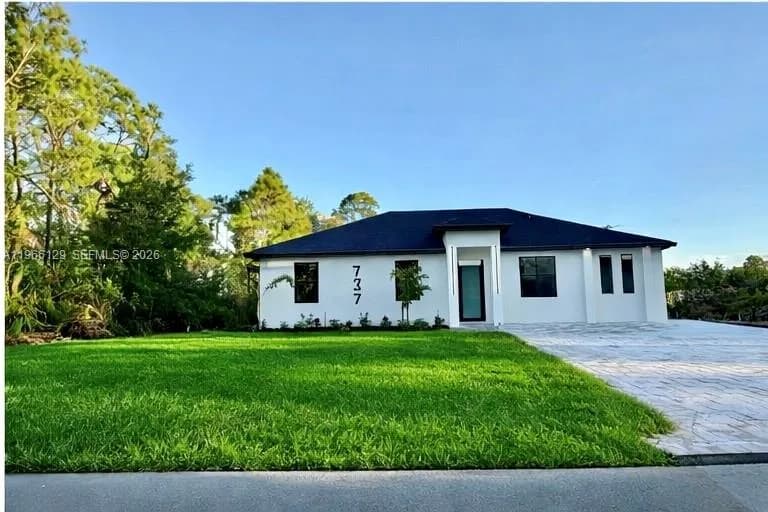 737 E THEODORE VAIL STREET, Lehigh Acres FL 33974
