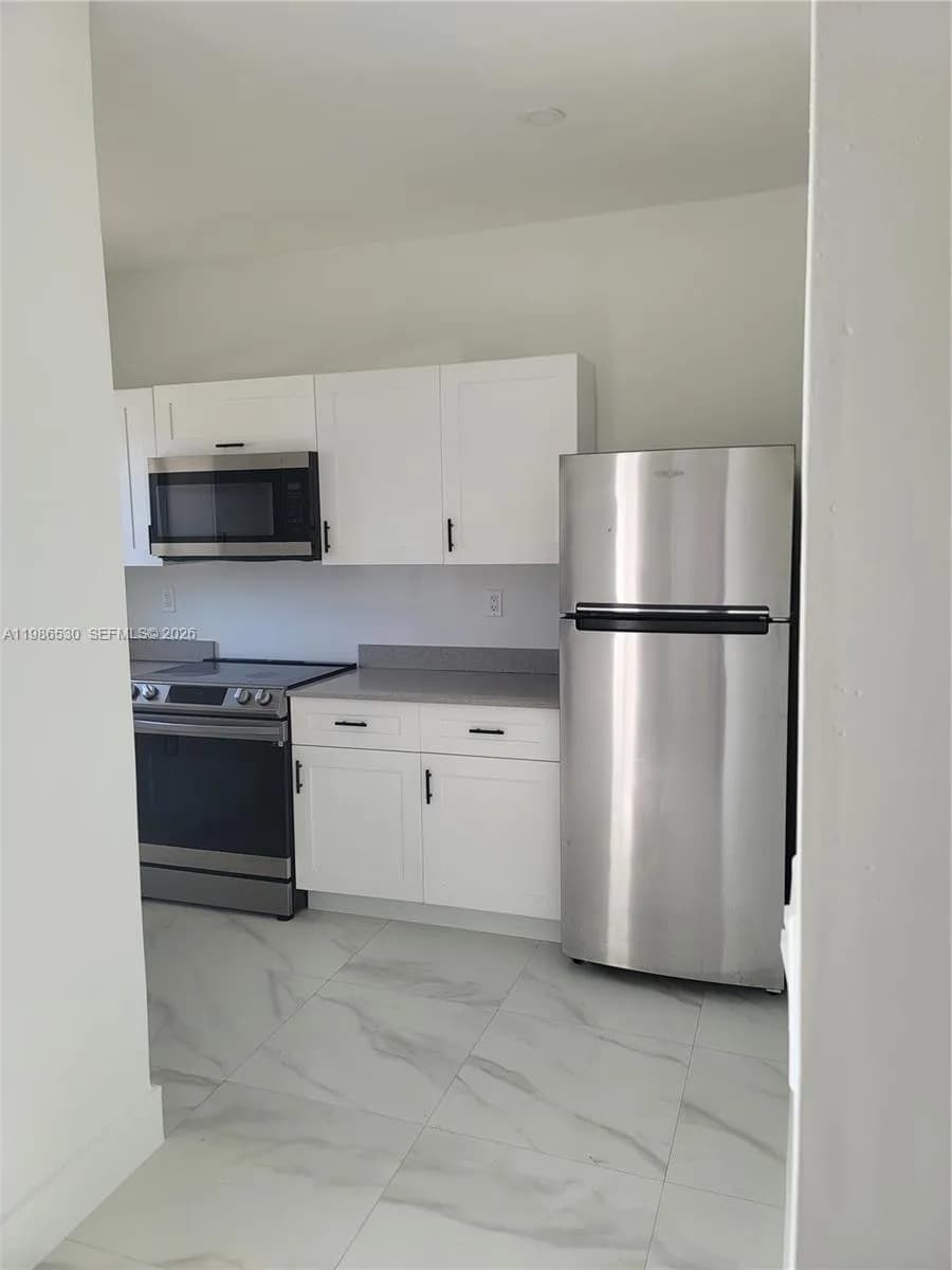 1975 NW 24th Ct, Miami FL 33125