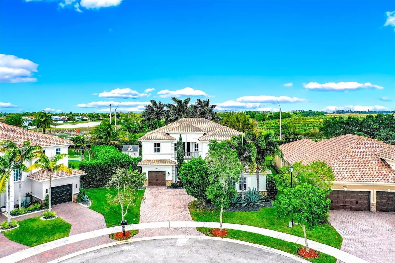 5 bedroom 4 bath Residential for sale at 8766 Miralago Way, Parkland FL 33076