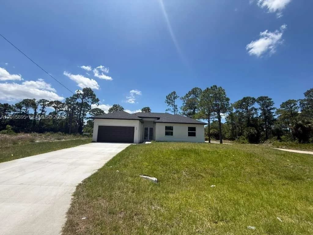 908 WINTERS ST E, Lehigh Acres FL 33974