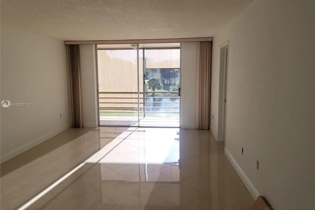 8450 Sunrise Lakes Blvd # 202, Sunrise FL 33322