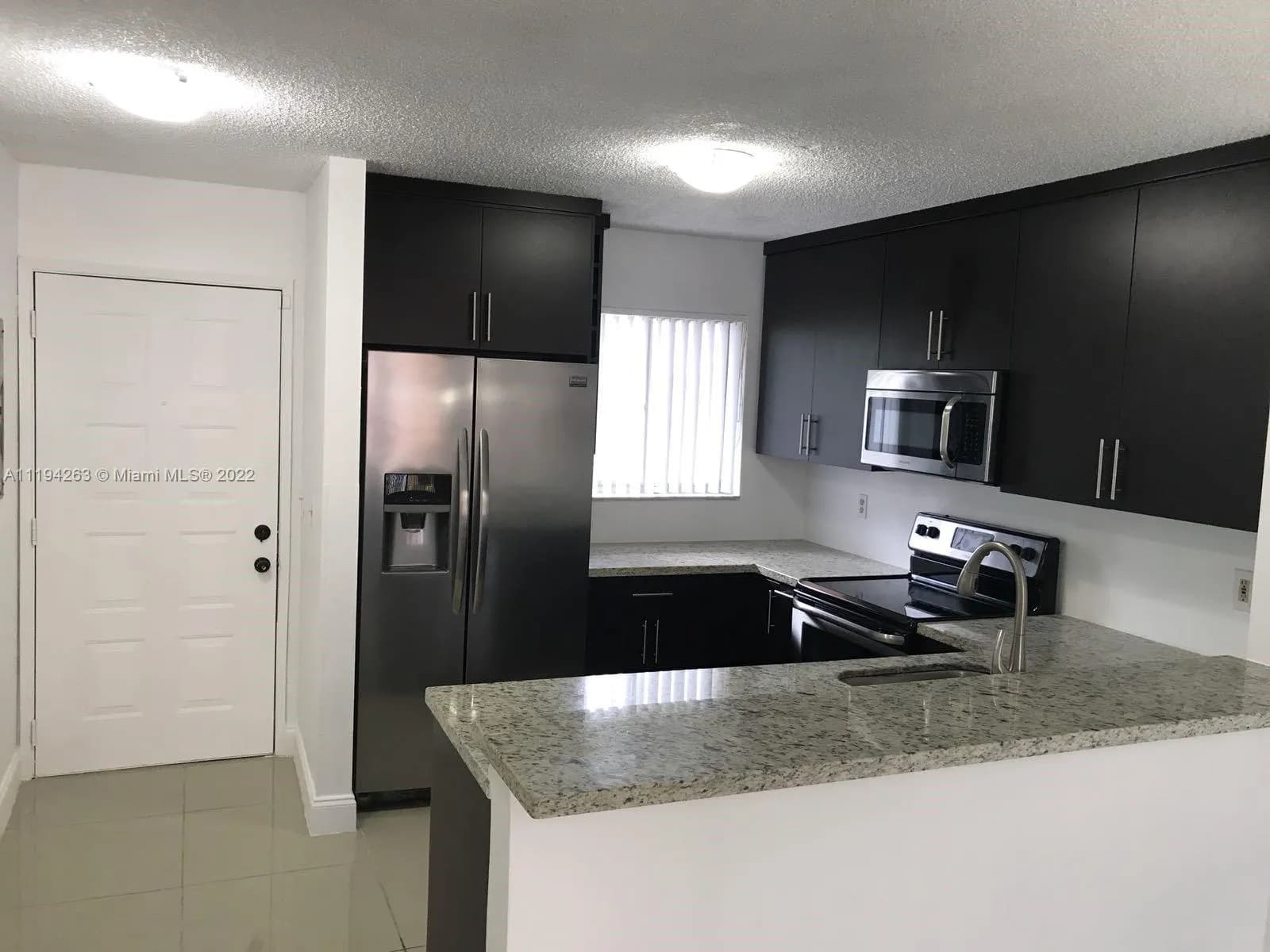 8730 N Sherman Cir # 302, Miramar FL 33025