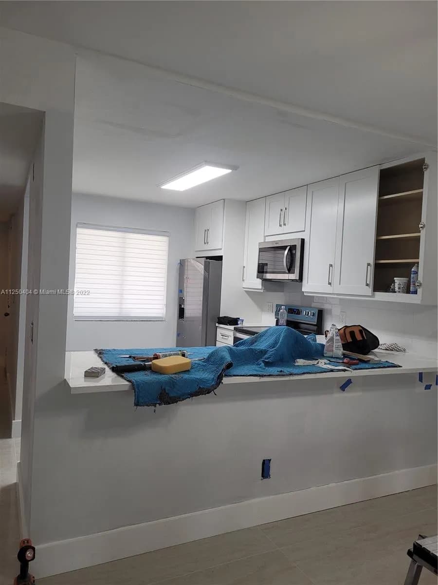 286 Racquet Club Rd # 105, Weston FL 33326