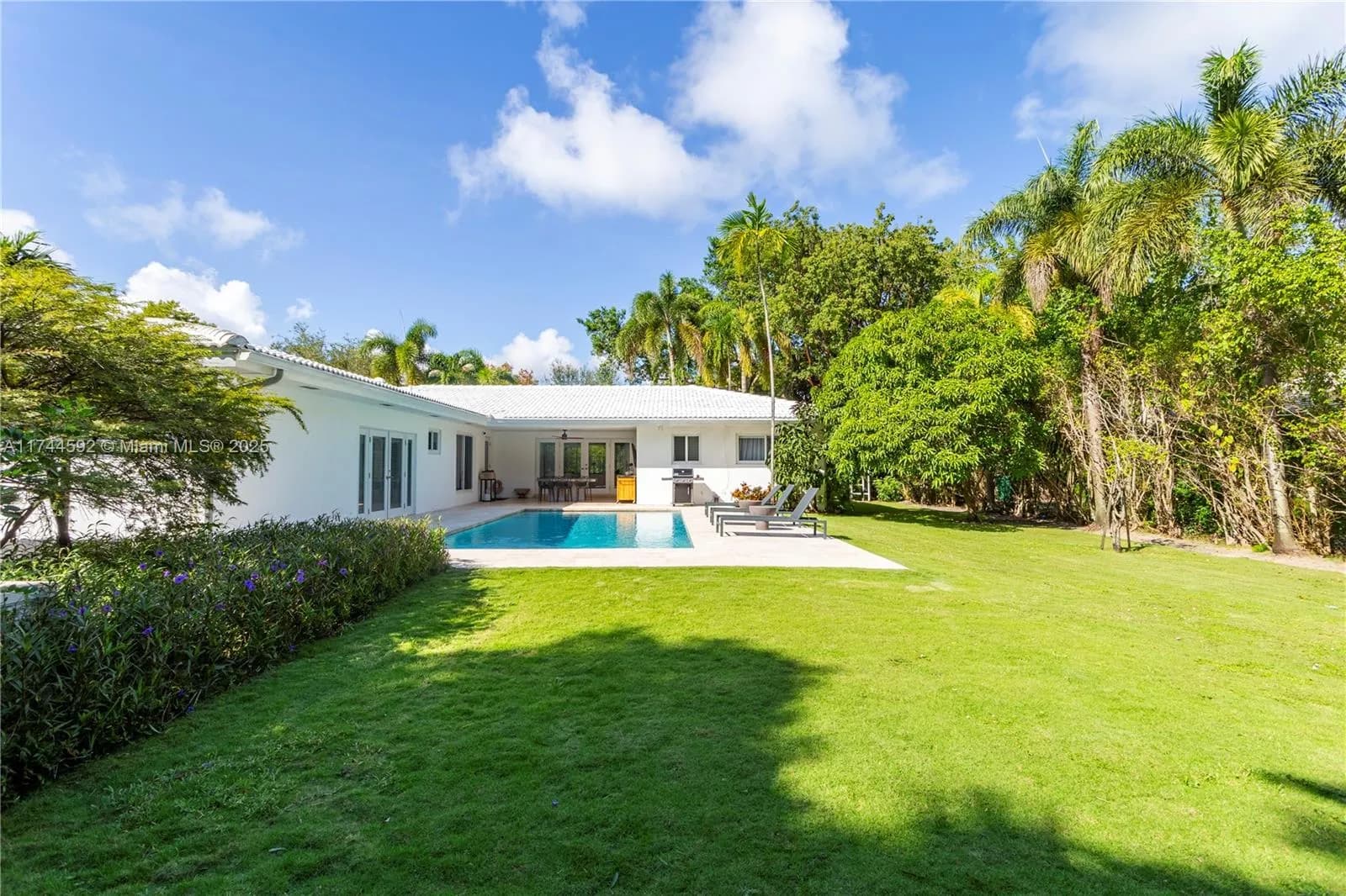 4 bedroom 3 bath for sale at 550 Pidgeon Plum Ln, Miami FL 33137