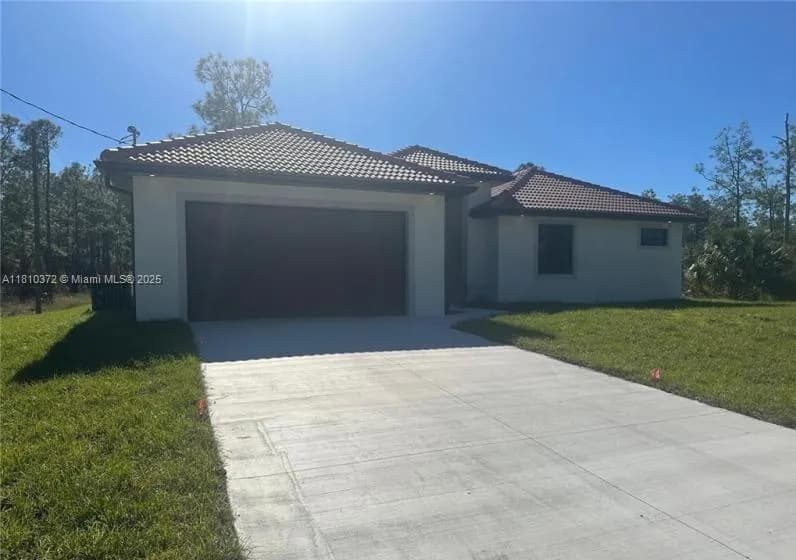 2002 E 13th St, Lehigh Acres FL 33972