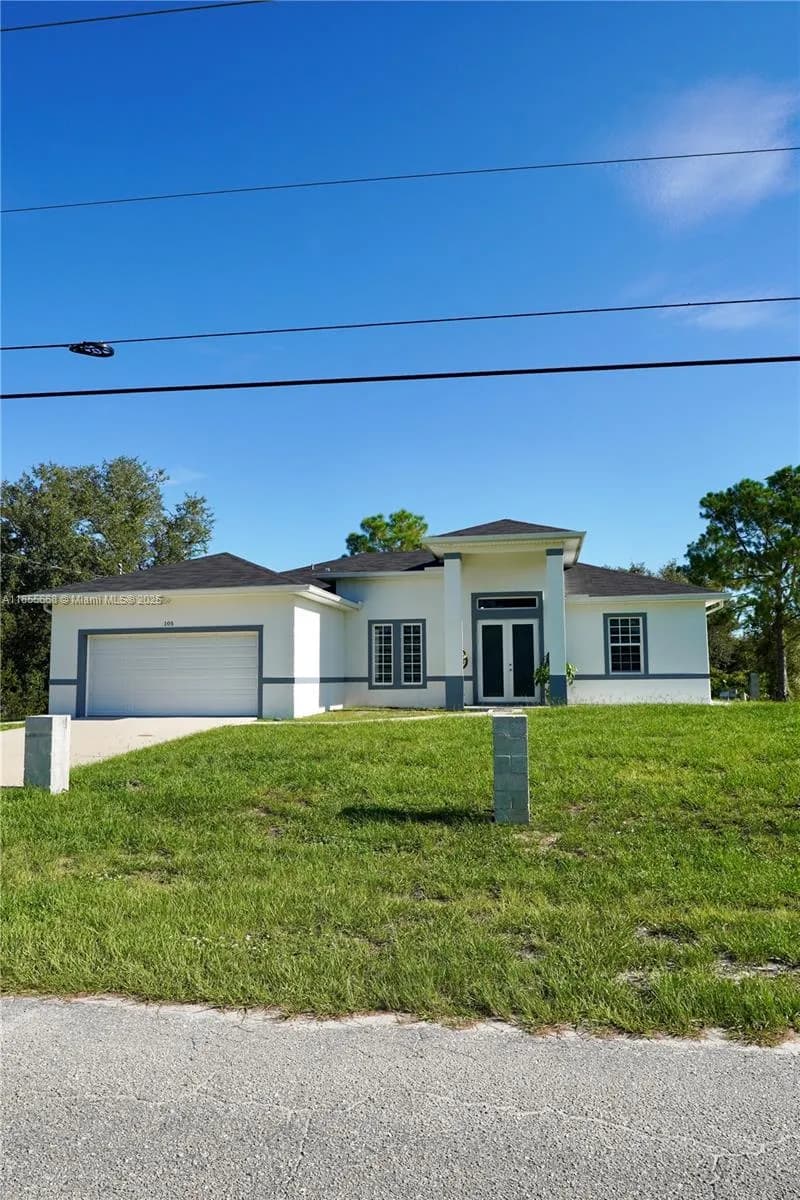 4 bedroom 3 bath for sale at 105 E 15th st, Lehigh Acres FL 33972