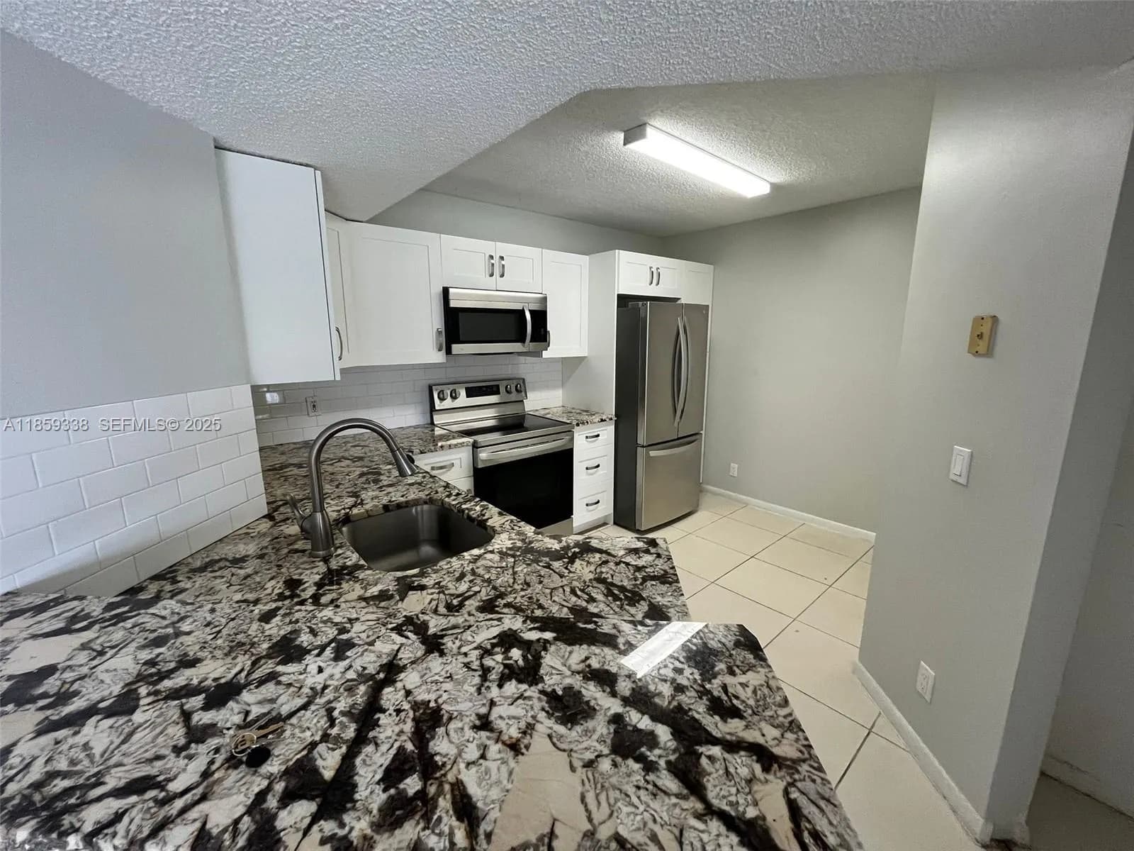 8821 Wiles Rd # 203, Coral Springs FL 33067
