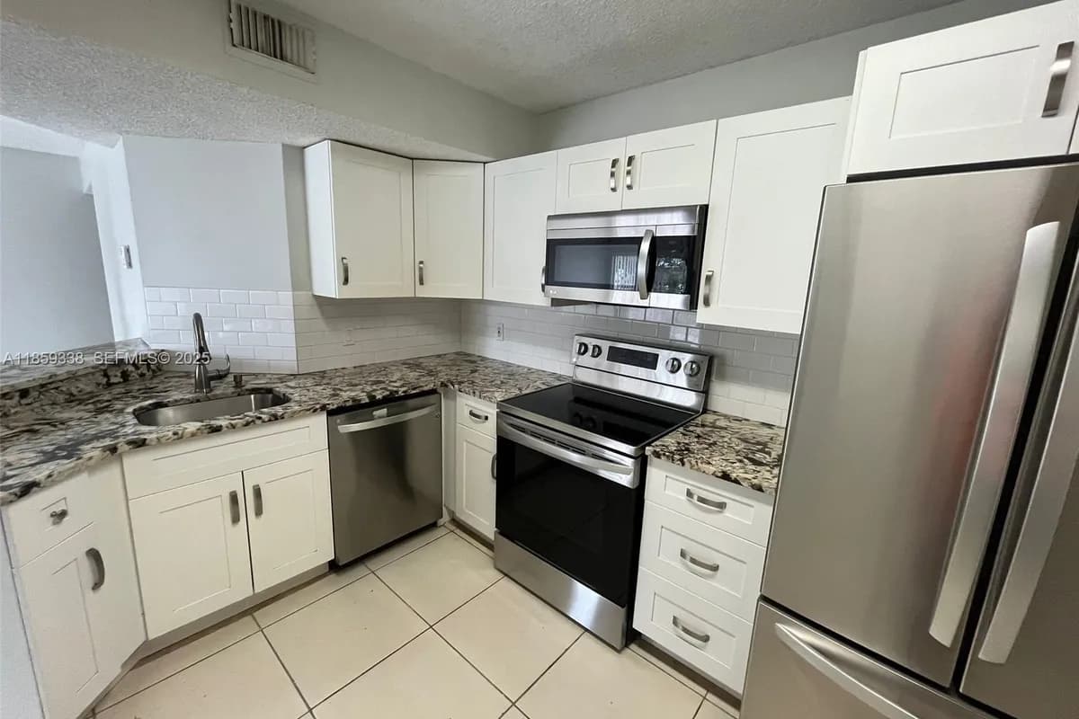 8821 Wiles Rd # 203, Coral Springs FL 33067