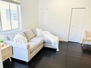 Luxury Living in Miami Beach’s Iconic Art Deco District: A Closer Look at 551 Michigan Ave #123 18 551 Michigan Ave 123 Miami Beach Living Room 2