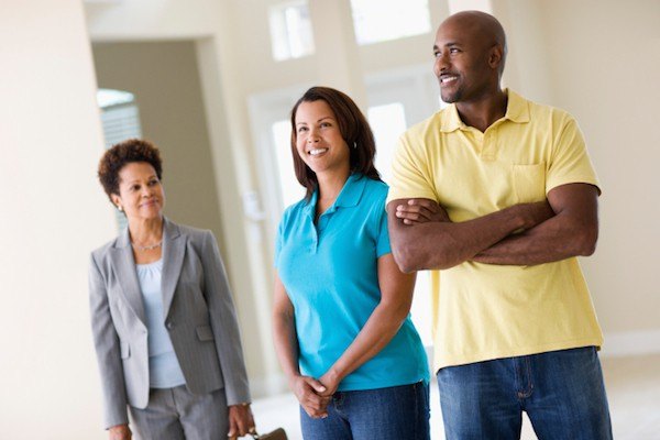 Couple house-hunting with Realtor