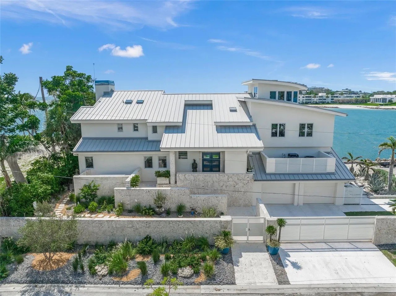 This private, Lido Shores mansion in Sarasota, FL is on the market for $26 million.