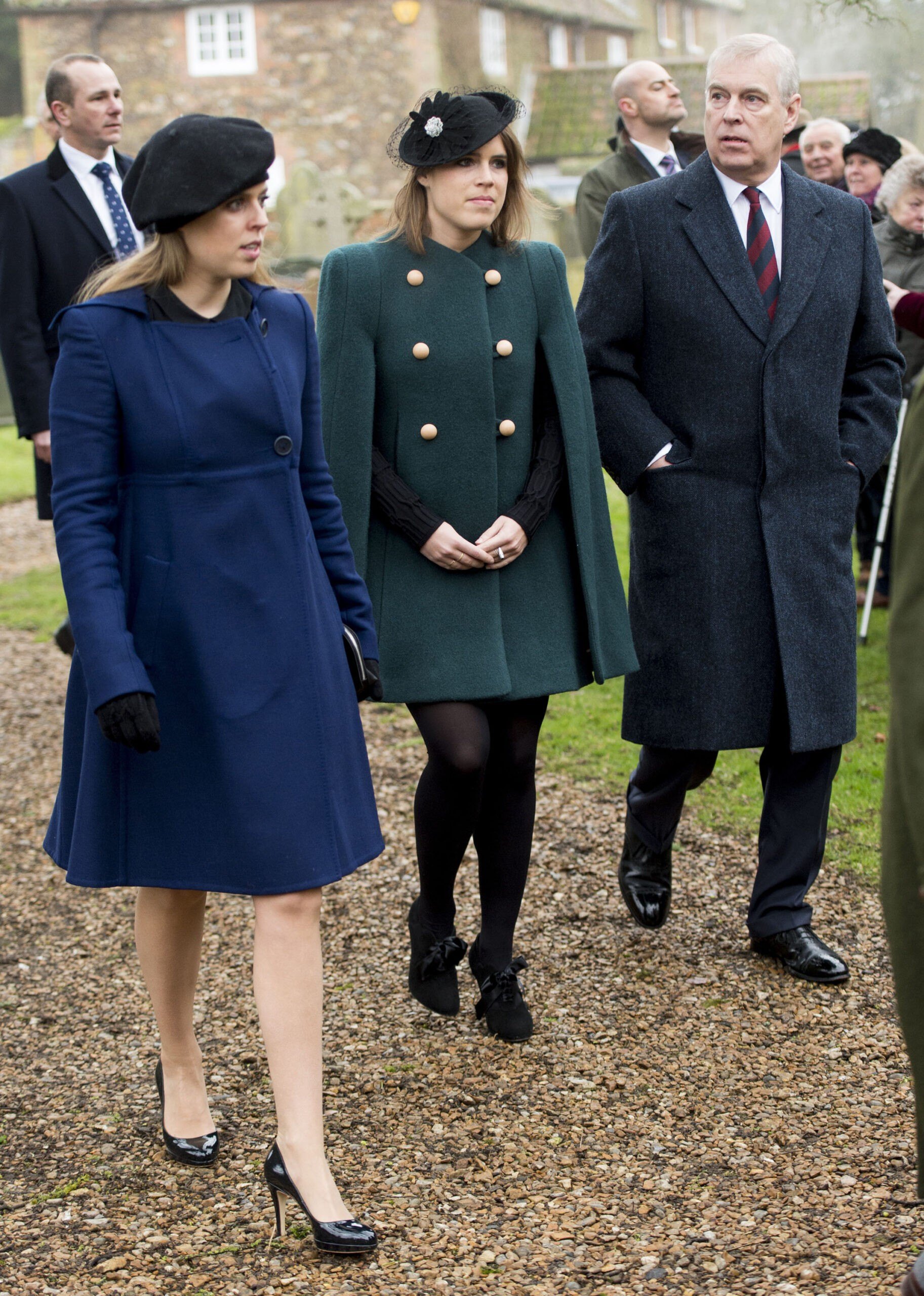 Princess Eugenie and Princess Beatrice with Prince Andrew, Duke of York arrive at St Lawrence Church on January 21, 2018