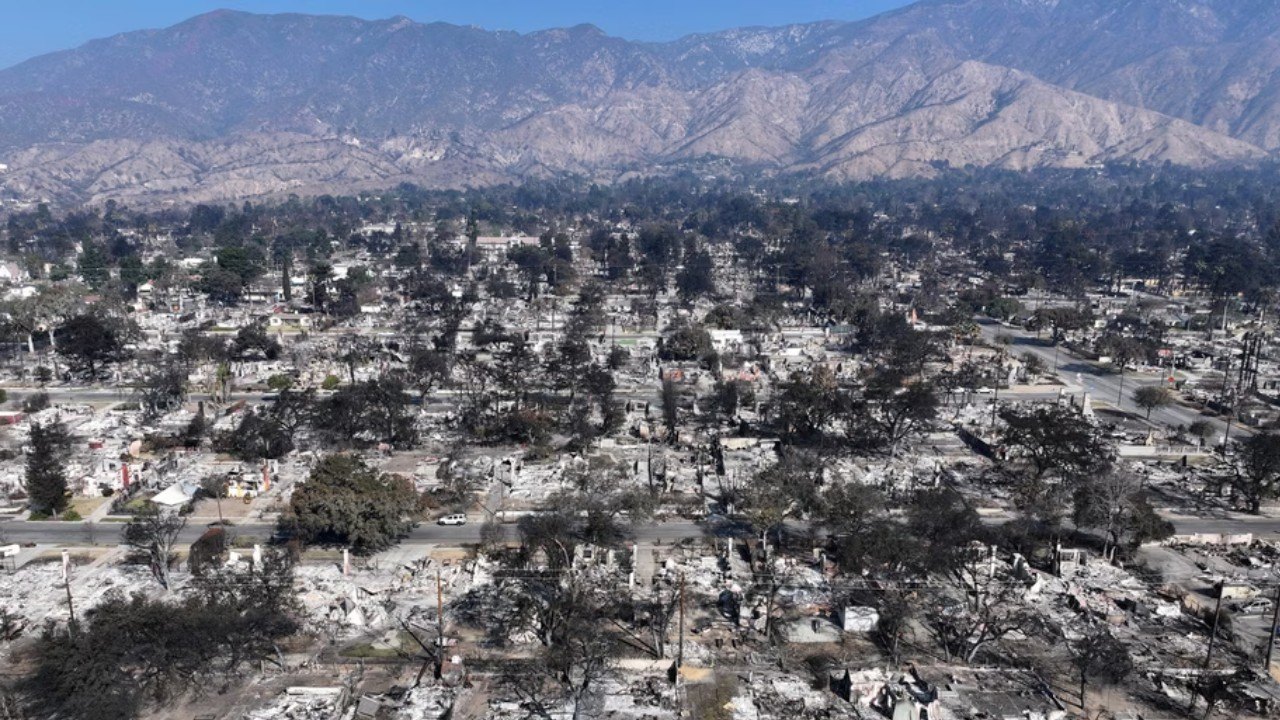 ALTADENA, CALIFORNIA - JANUARY 19: An aerial view of homes which burned in the Eaton Fire on January 19, 2025 in Altadena, California. Multiple wildfires which were fueled by intense Santa Ana Winds have burned across Los Angeles County leaving at least 27 dead with over 180,000 people having been under evacuation orders. Over 12,000 structures, many of them homes and businesses, burned in the Palisades and Eaton Fires. (Photo by Mario Tama/Getty Images)