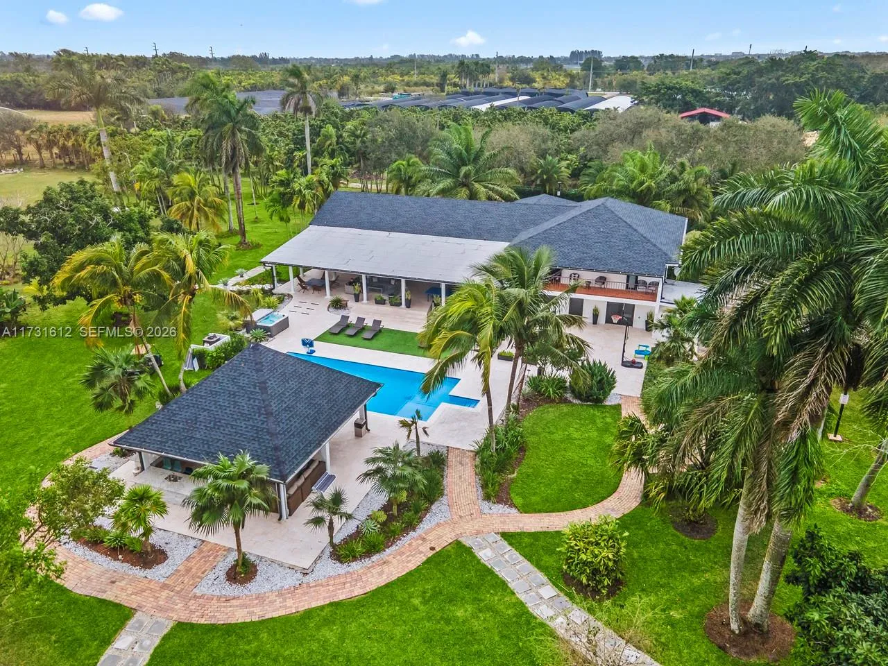 5 bedroom 6 bath for sale at 14875 SW 212th St, Miami FL 33187