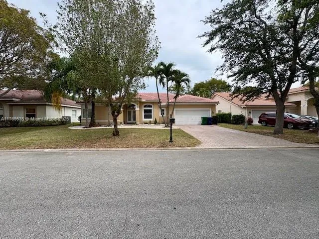 4 bedroom 3 bath for sale at 10261 NW 54th Pl, Coral Springs FL 33076