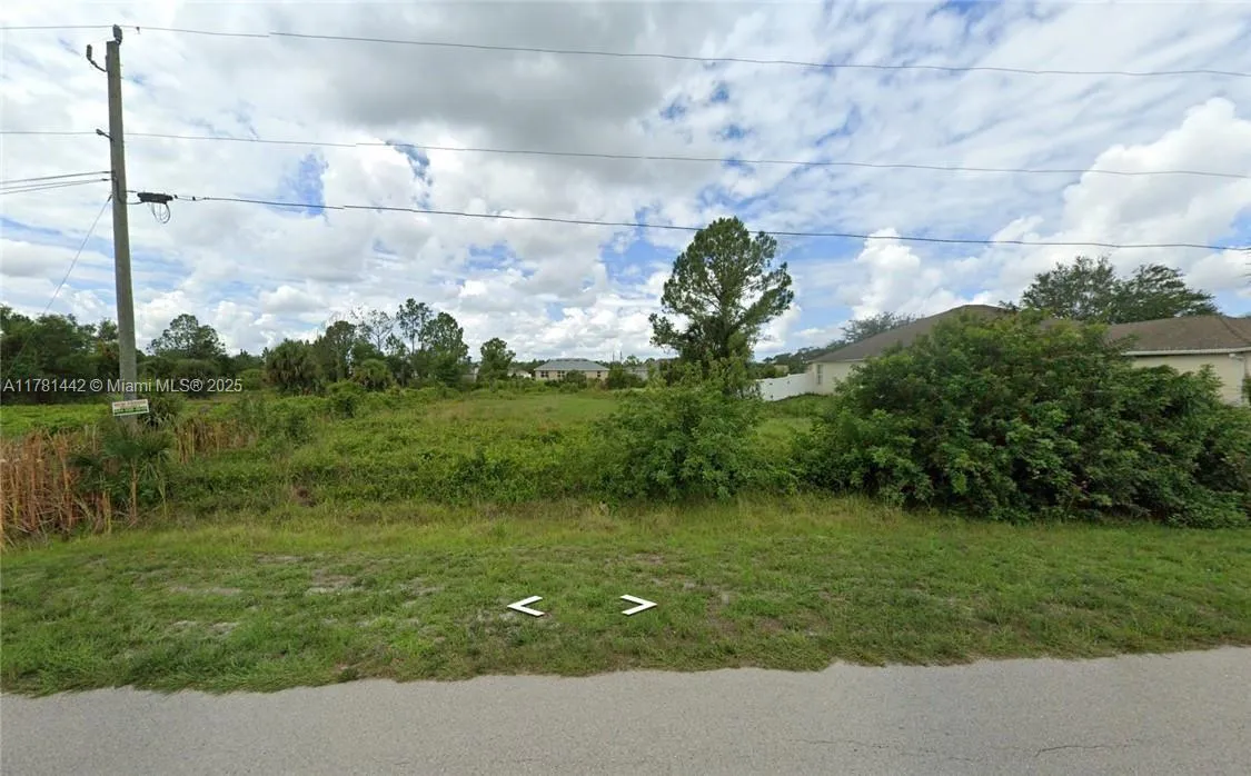 1908 Quintero LN, Lehigh Acres FL 33972
