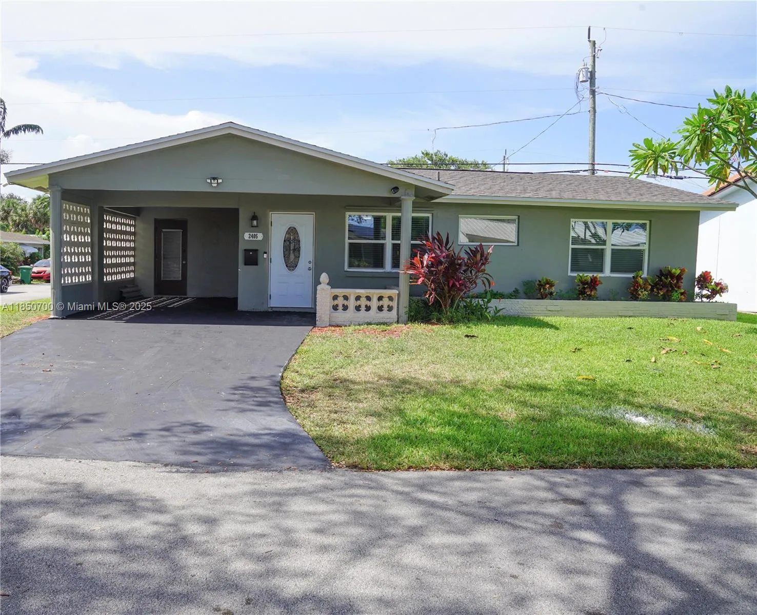 3 bedroom 2 bath for sale at 2405 NW 54th St, Tamarac FL 33309