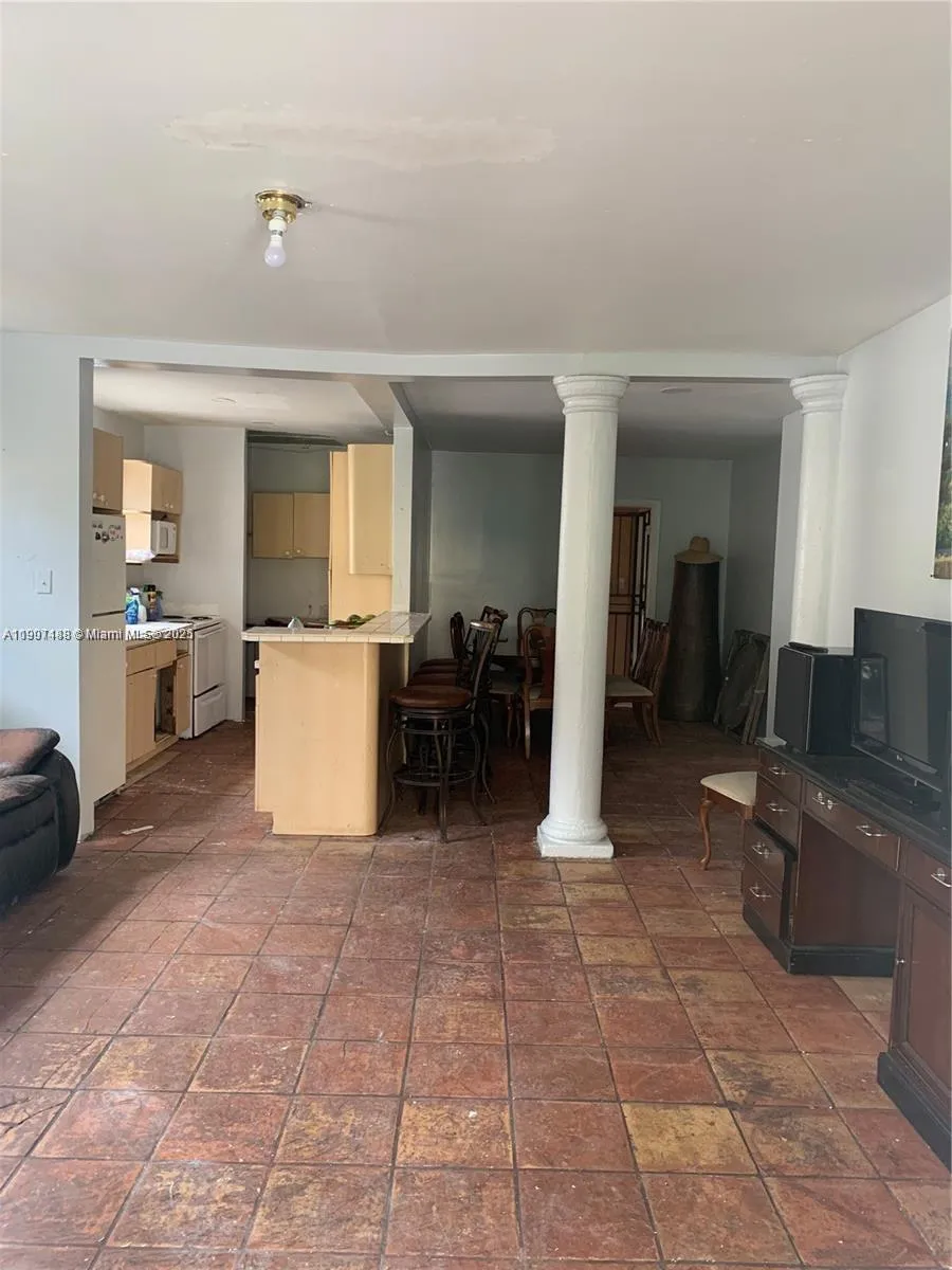 3 bedroom 2 bath for sale at 1037 NW 30th St, Miami FL 33127