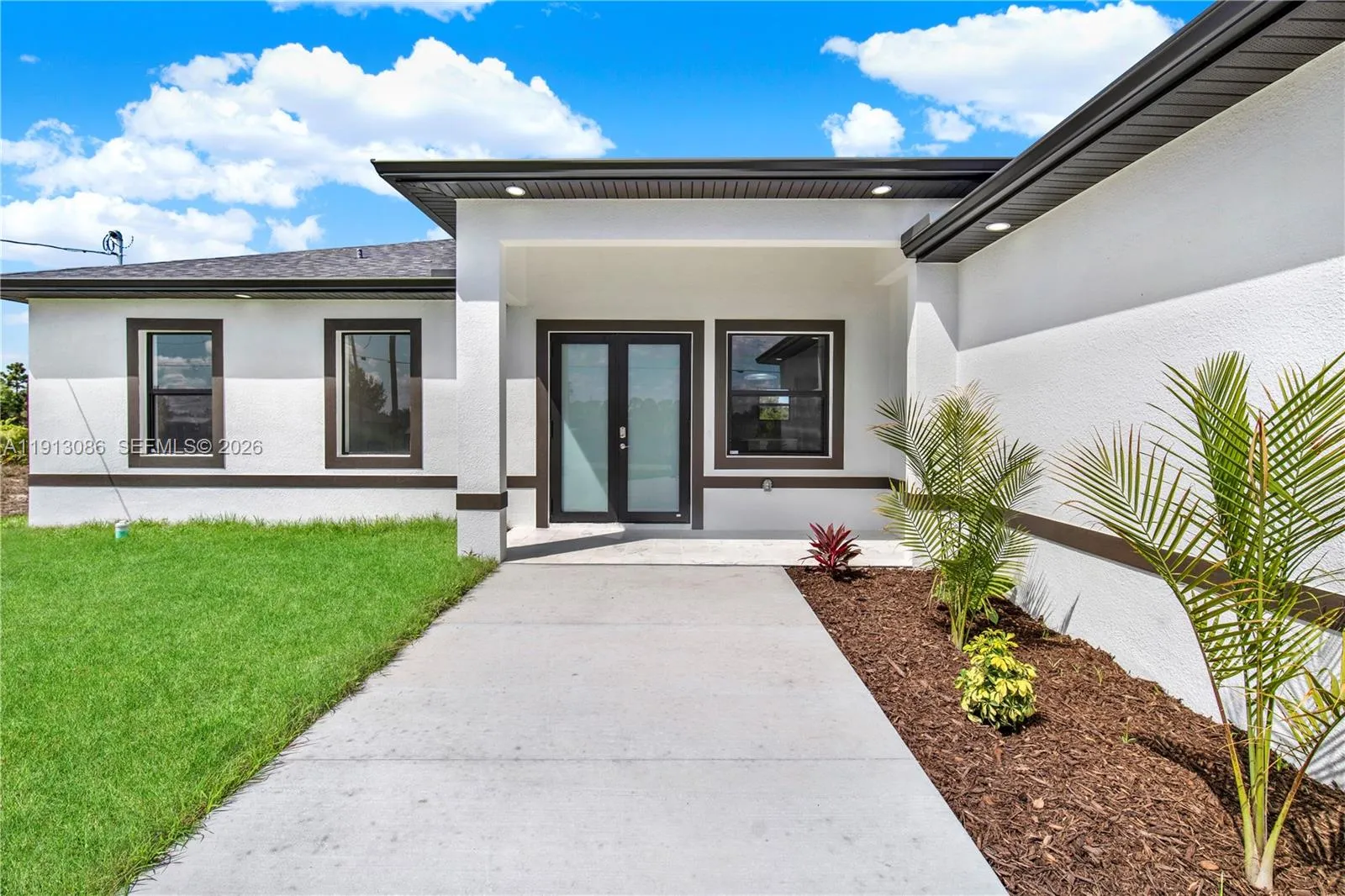 4 bedroom 2 bath for sale at 916 Manresa Ave S, Lehigh Acres FL 33974