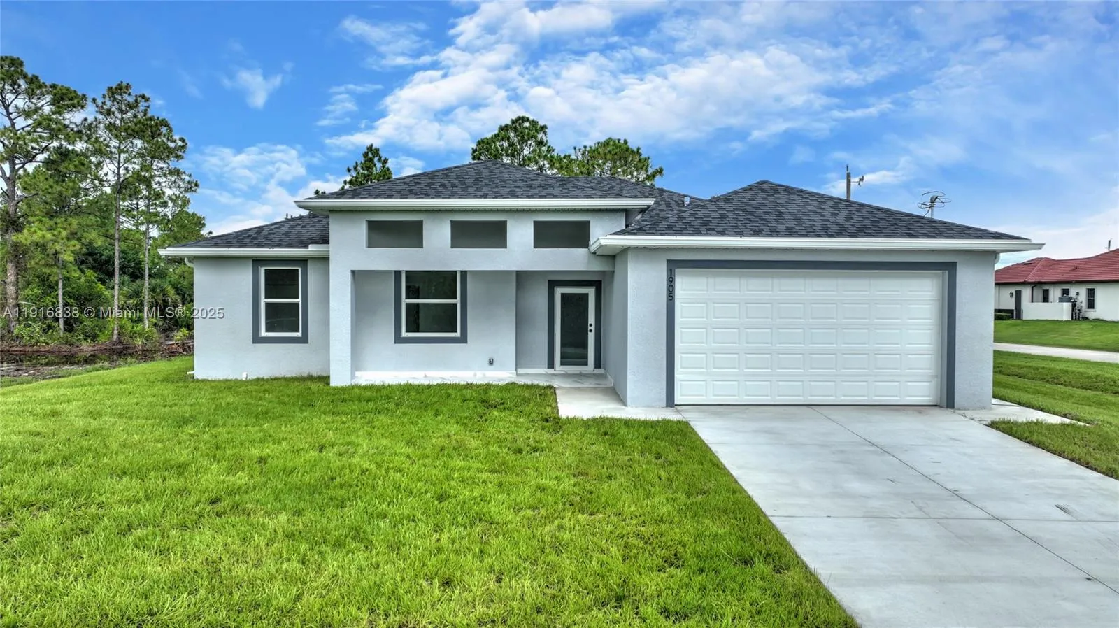 4 bedroom 3 bath for sale at 1905 Charles Ave N, Lehigh Acres FL 33971