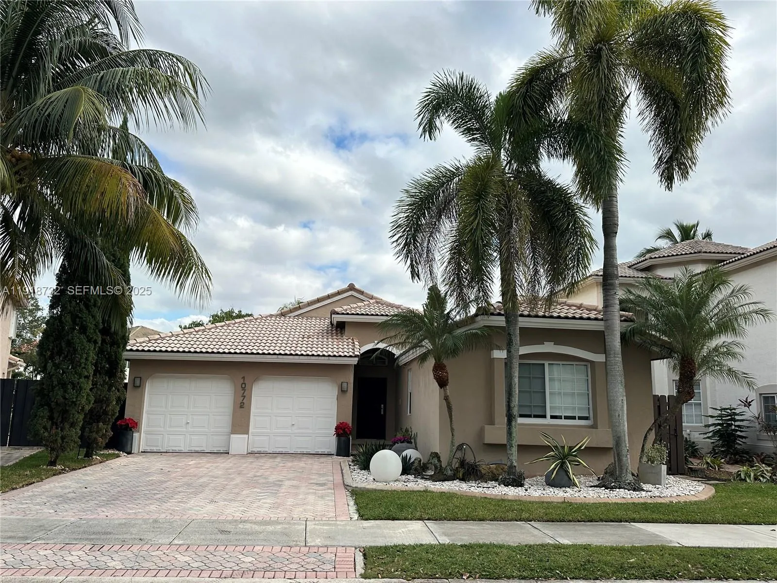 4 bedroom 2 bath for sale at 10772 NW 71st St, Doral FL 33178
